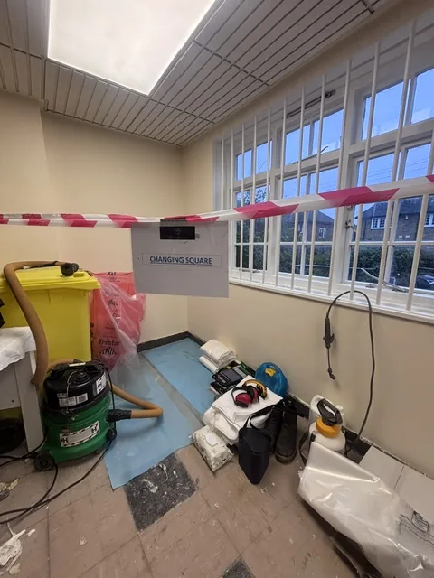 Asbestos floor tile and bitumen removal in Highbury